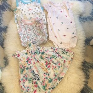 5 baby girls onesies and floral dress